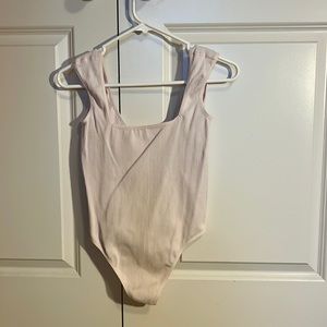 Urban outfitters, Out from under light pink ribbed body suit.